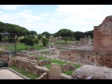 03903 ostia - regio i - insula iv - domus di giove e ganimede (i,iv,2) - blick von der dachterasse ri regio i - forum - basilica (i,xi,5) - tempio rotondo (i,xi,1).jpg